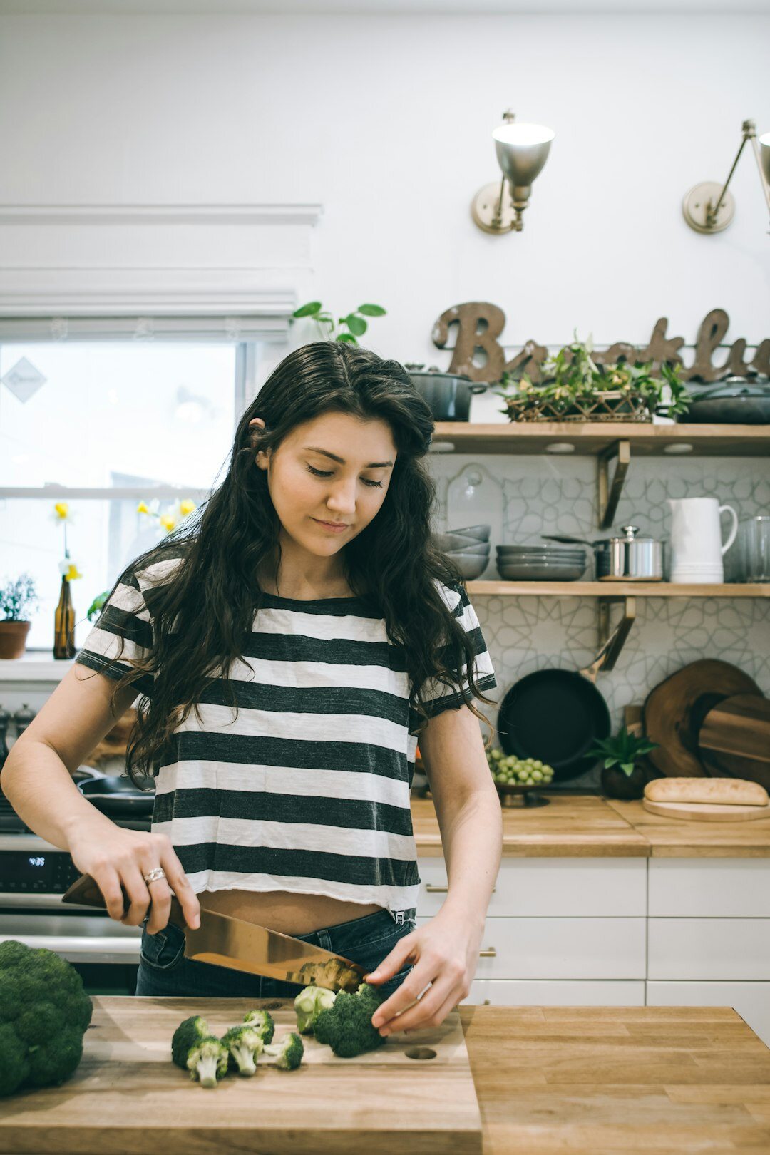 woman preparing vegetable snacks