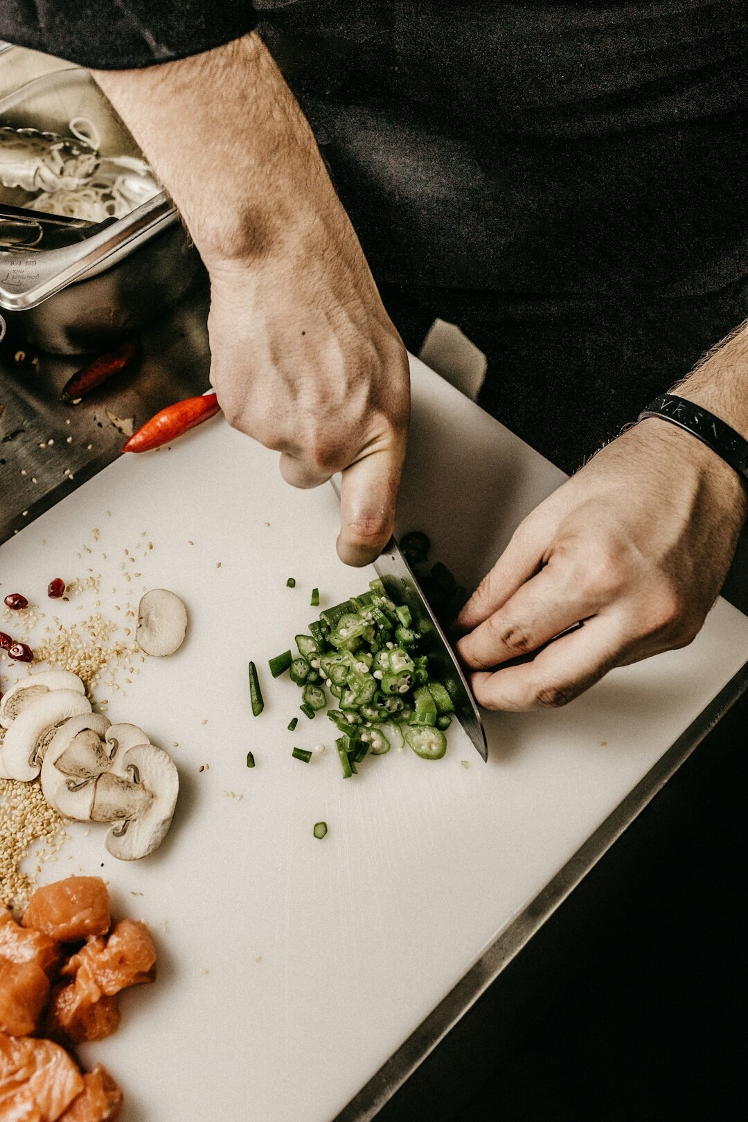 person chopping vegetables